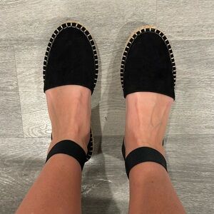 Black ankle strap mule; women’s size 8.5